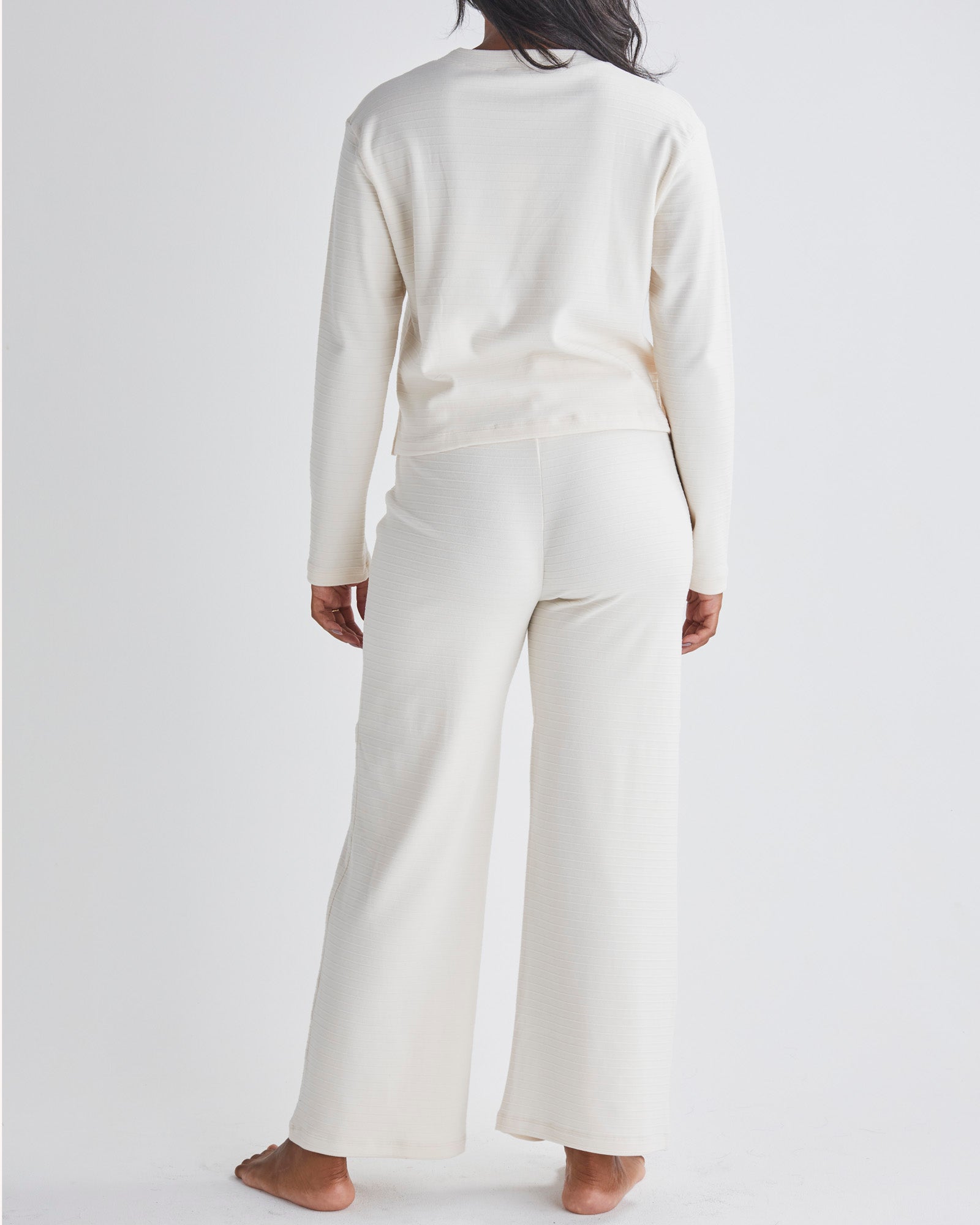 Back View - A pregnant Woman Wearing 2-piece Maternity Winter Lounge Set in Cream White from Angel Maternity