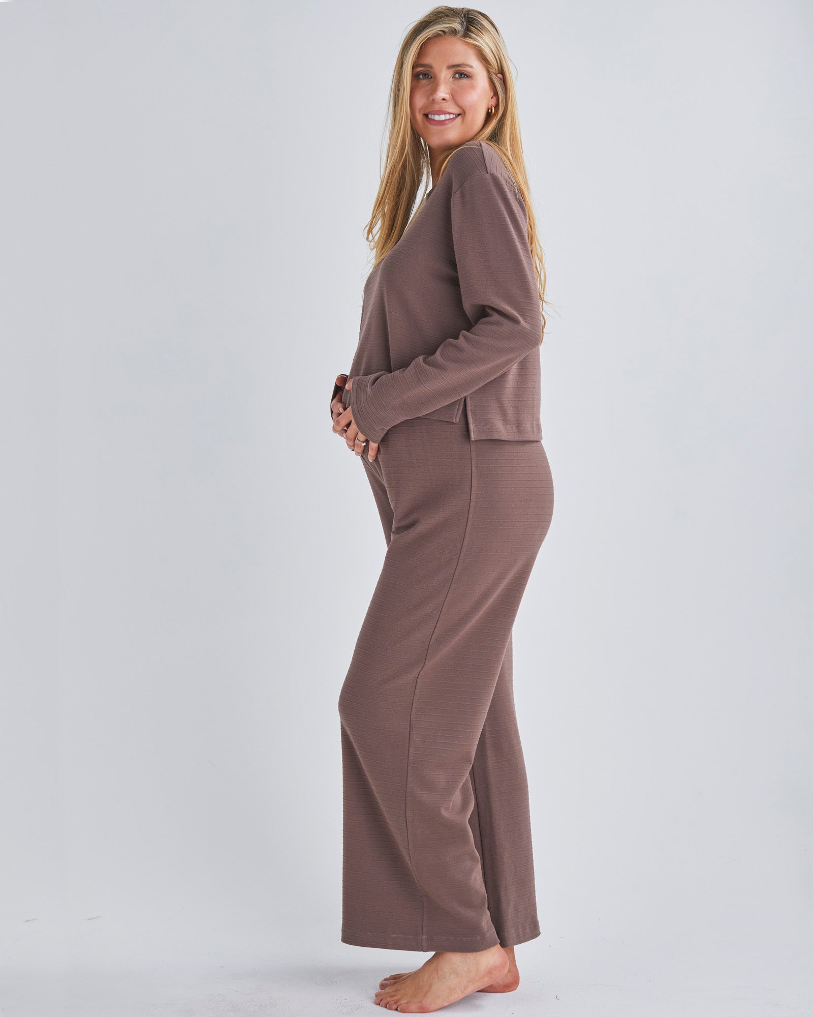 Side View - A pregnant Woman Wearing 2-piece Maternity Winter Lounge Set in Mocha from Angel Maternity