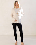 white knit maternity jumper with black maternity legging