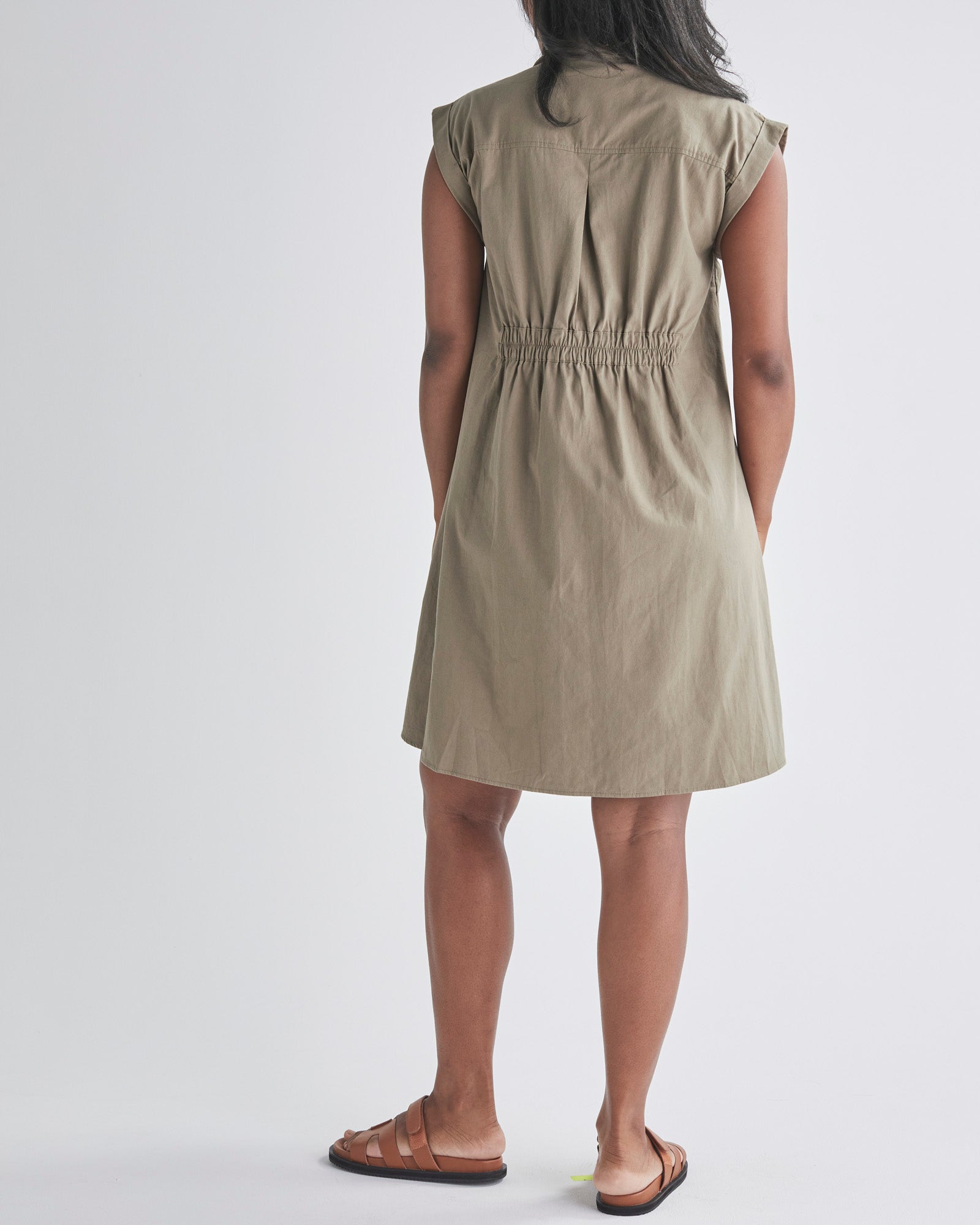 Back View - A Pregnannt Woman Wearing Kaya Maternity Safari Shirt Dress In Khaki from Angel Maternity Australia.