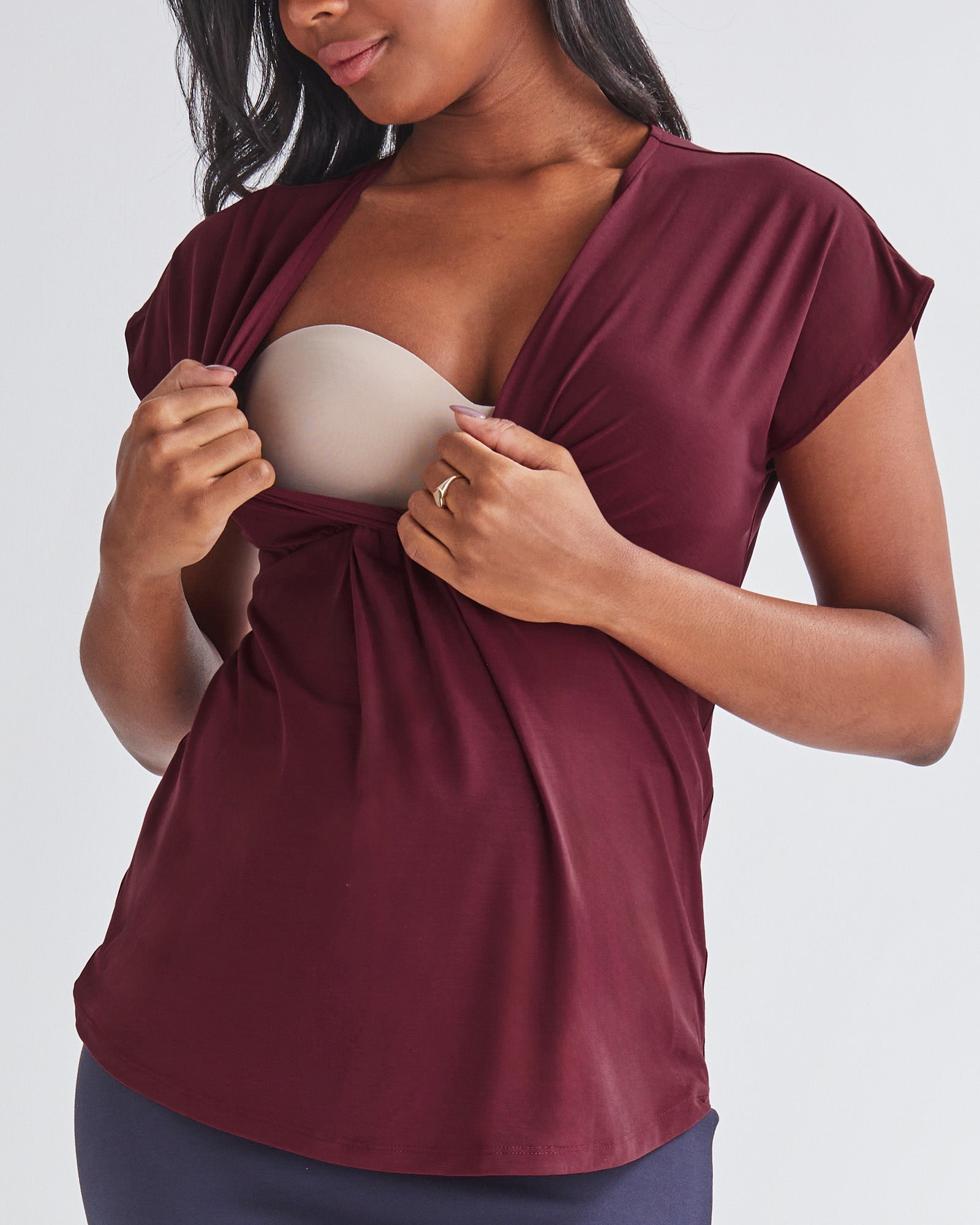 Breastfeeding Friendli - A Pregnannt Woman Wearing Maternity Crossover Burgundy Work Top in from Angel Maternity Showing Easy Access to Breastfeeding.