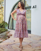 Front view- maternity ruffled neck floral dress