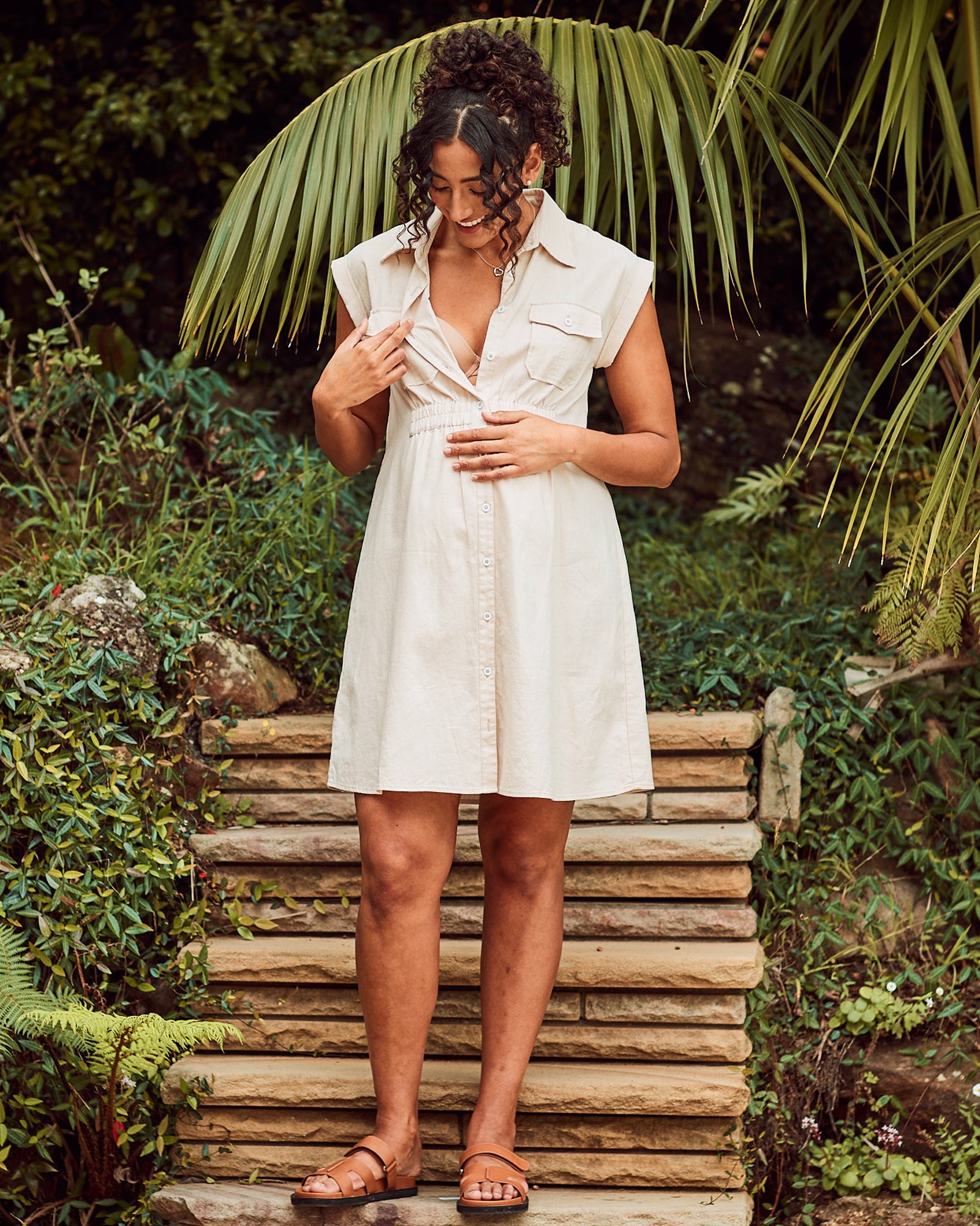 Breastfeeding Freindly - A Pregnannt Woman Wearing Kaya Maternity Safari Shirt Dress In Beige from Angel Maternity showing Showing Easy Access to Breastfeeding.