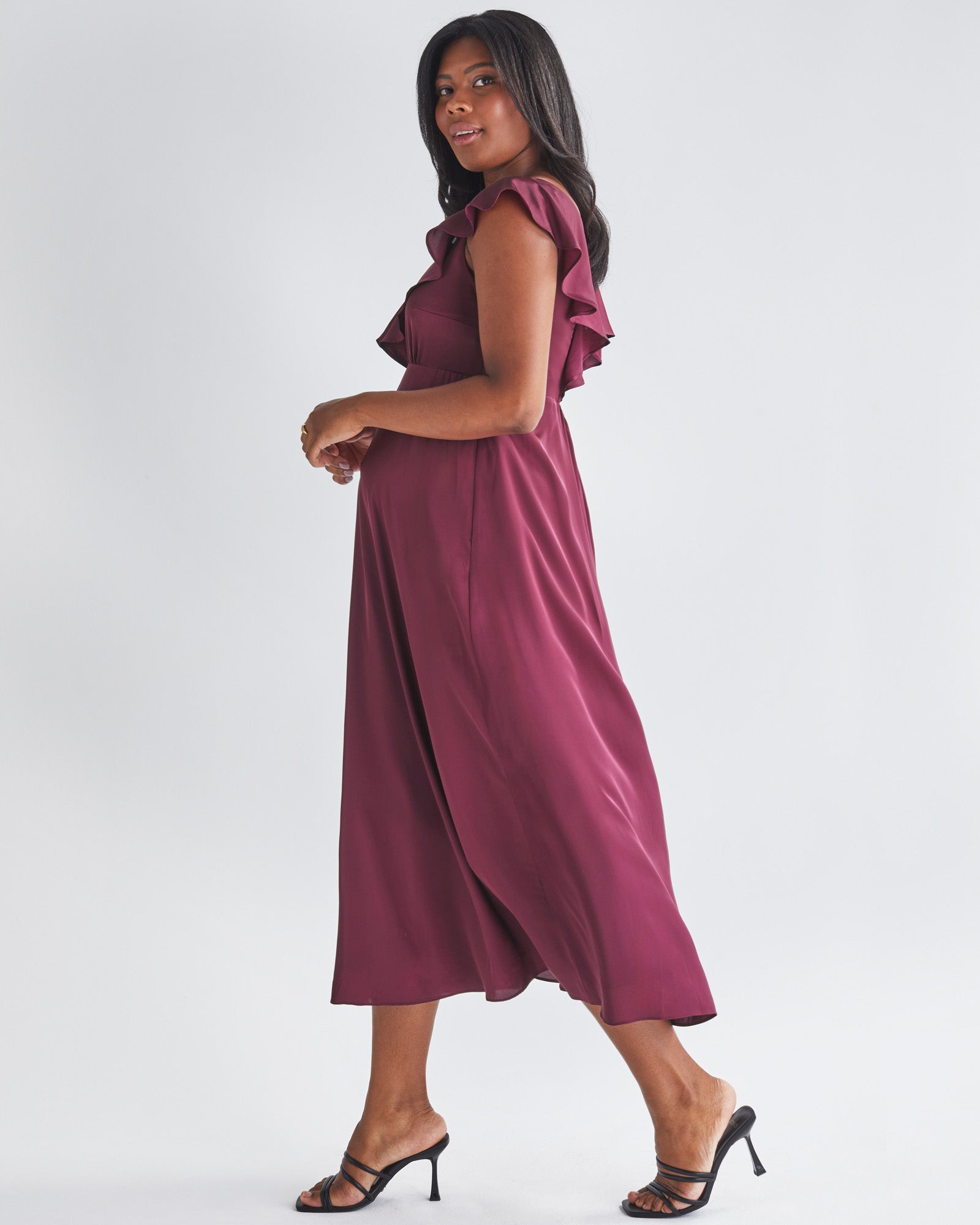Main View - A Pregnannt Woman Wearing Mika Maternity Evening Ruffle Dress in Wine from Angel Maternity.