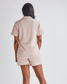Back View - A Pregnannt Woman Wearing Maternity and Nursing Summer Pyjama Set in Pink - Short Sleeve Top & Shorts from Angel Maternity Australia.