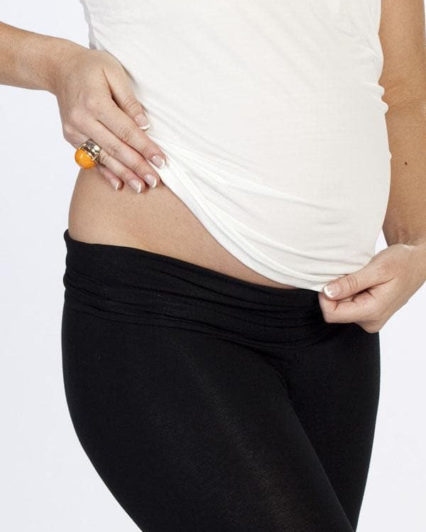 A model in 2 pack black maternity foldable waist leggings, detail (4506713227367)