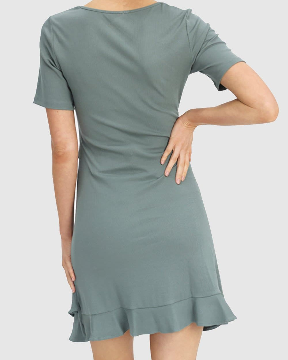 Back View - A Pregnant Woman Maternity Short Sleeve Frilled Dress in Dusty Mint