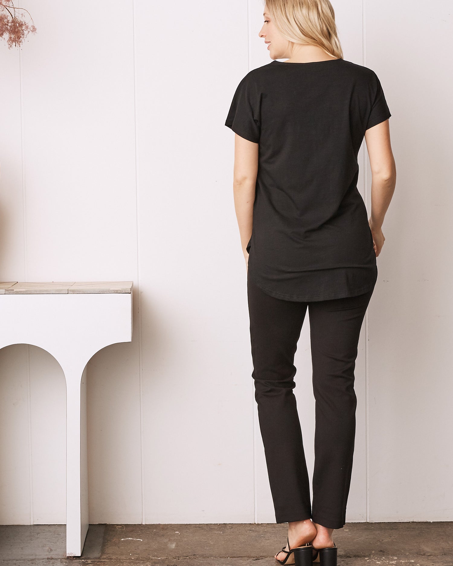 Back view - A Pregnant Woman in Black Short Sleeve Zip Front Maternity Work Blouse (6711878254695)