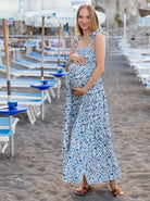 Main View - A pregnant Woman in Nursing Friendly Shoulder Tie Maternity Maxi Dress in Blue Print