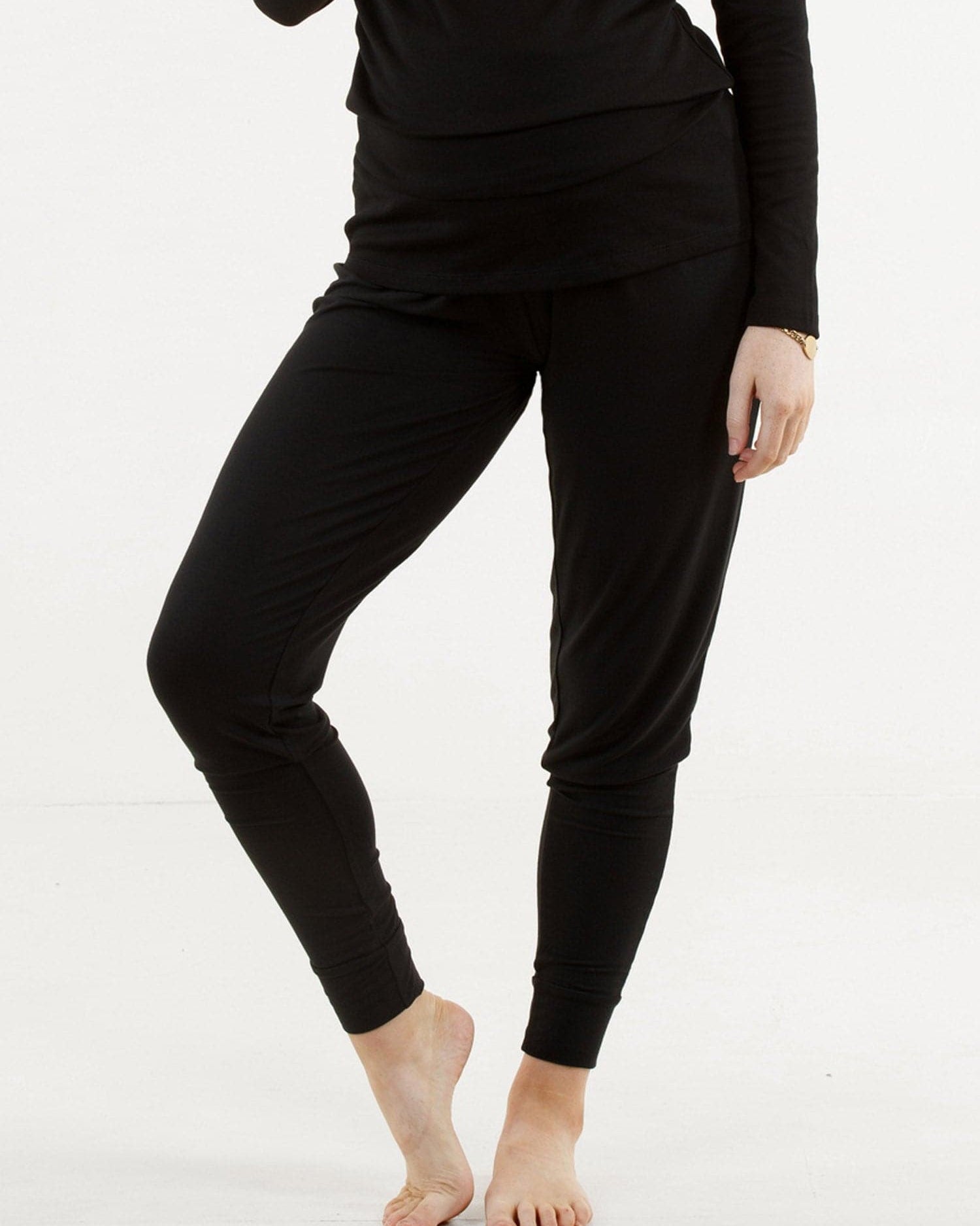 A woman in black bamboo maternity lounge pants, main (189033512981)