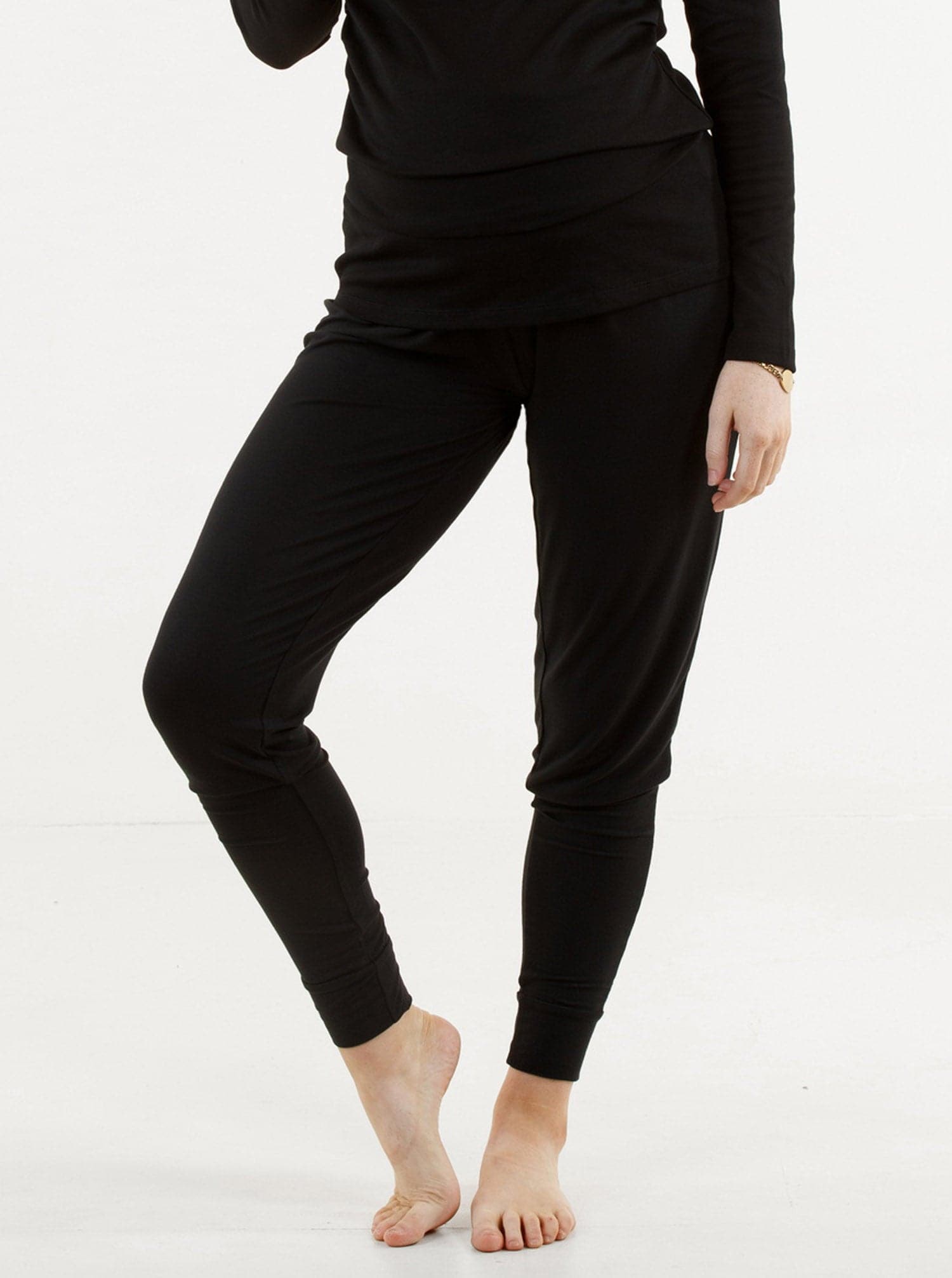 A woman in black bamboo maternity lounge pants, main (189033512981)