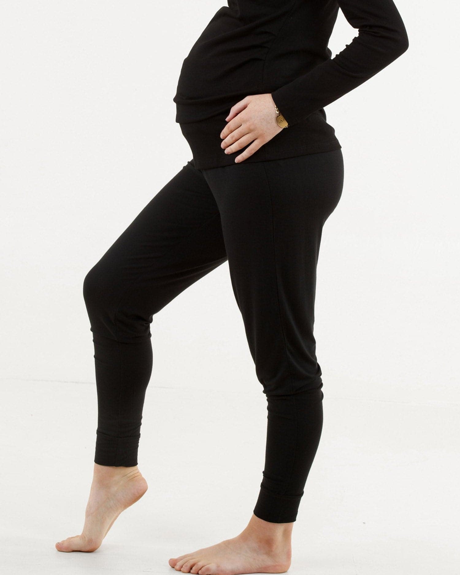 A woman in black bamboo maternity lounge pants, side (189033512981)