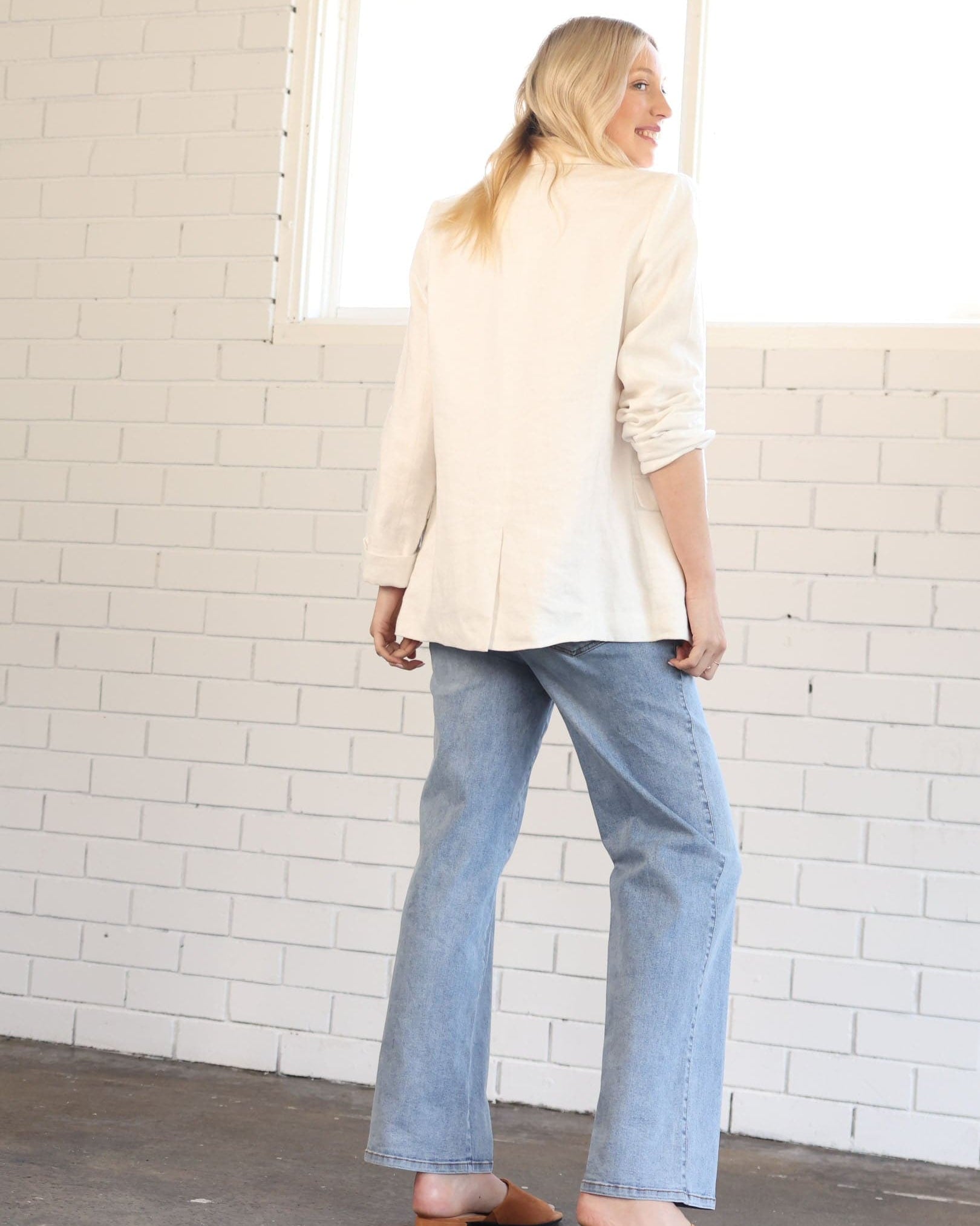 Back view - A Pregnant Woman in White Maternity Linen Jacket in  (6699018584167)