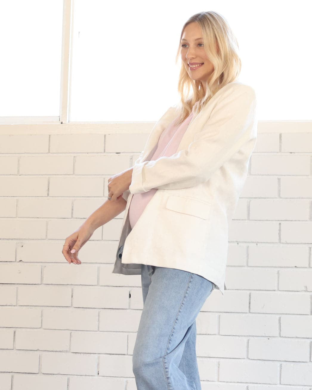 Side view - A Pregnant Woman in White Maternity Linen Jacket in  (6699018584167)