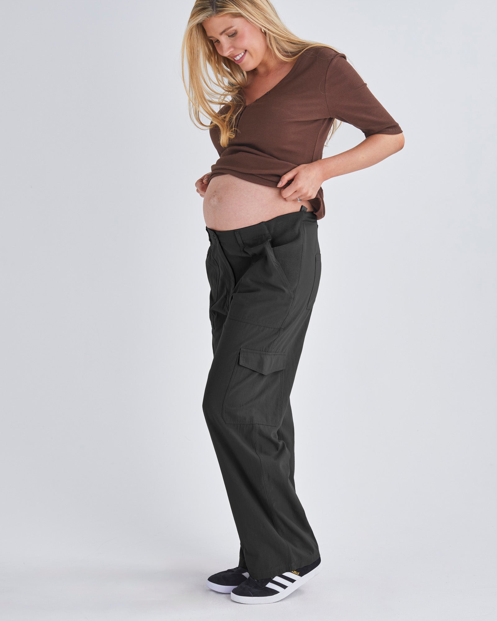 Full View - A Pregnant Woman Wearing Black Maternity Cotton Cargo Pants from Angel Maternity