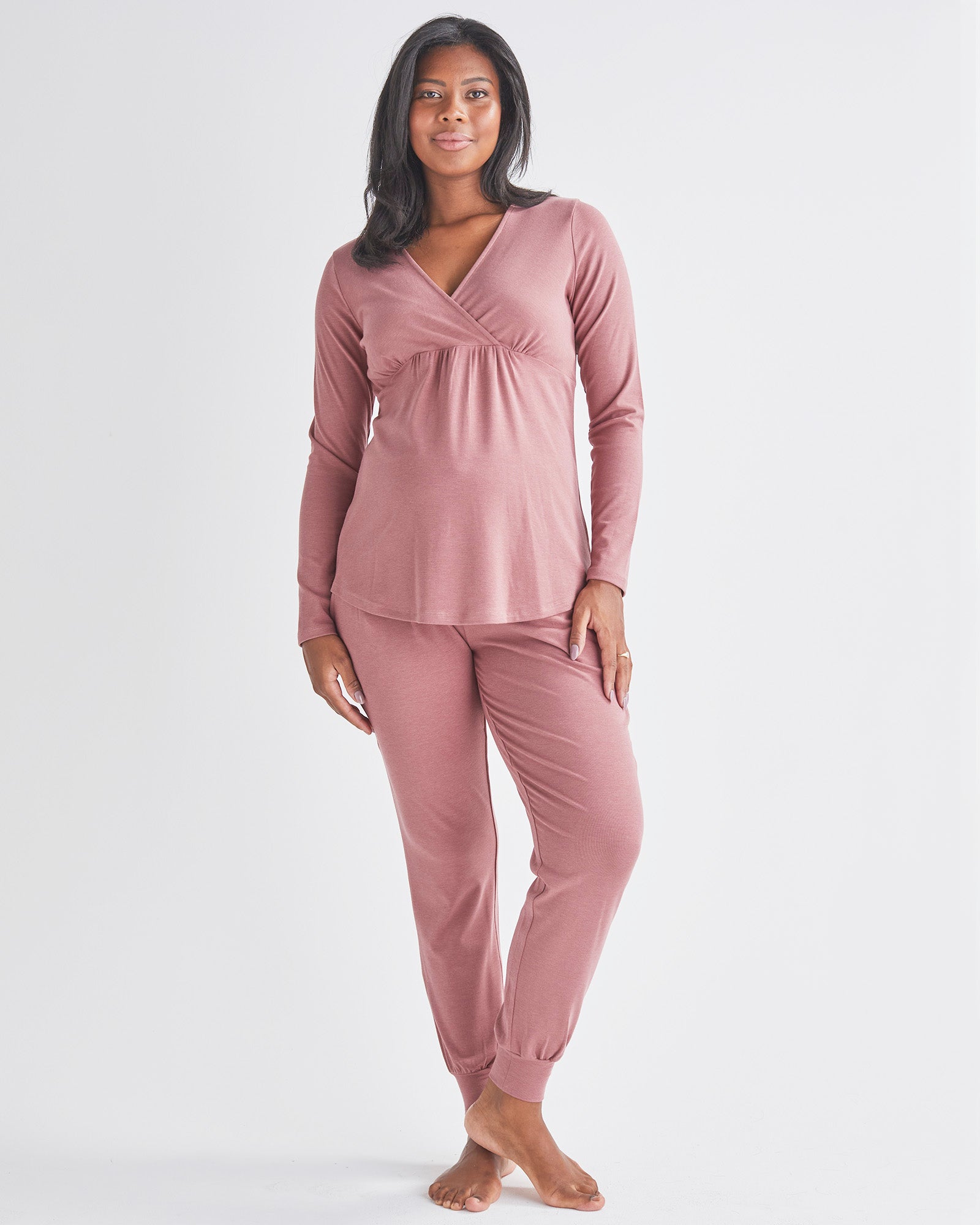 A Pregnant Woman Wearing 2-Piece Kyra Maternity Loungewear/Sleepwear PJ set in Pink from Angel maternity