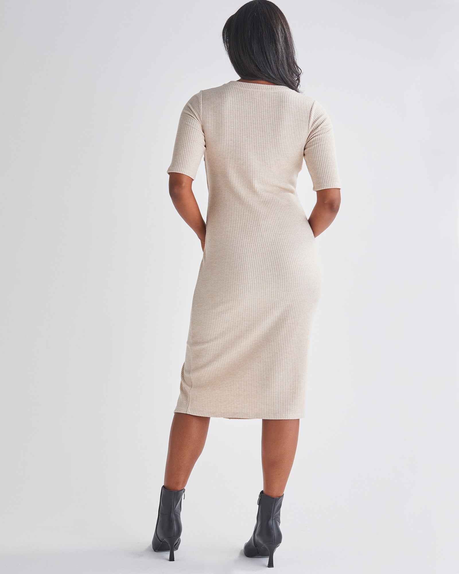 Back View - A Pregnant Woman Maternity Elegance Bodycon Dress in Cream with Lift Side Buttons from Angel maternity