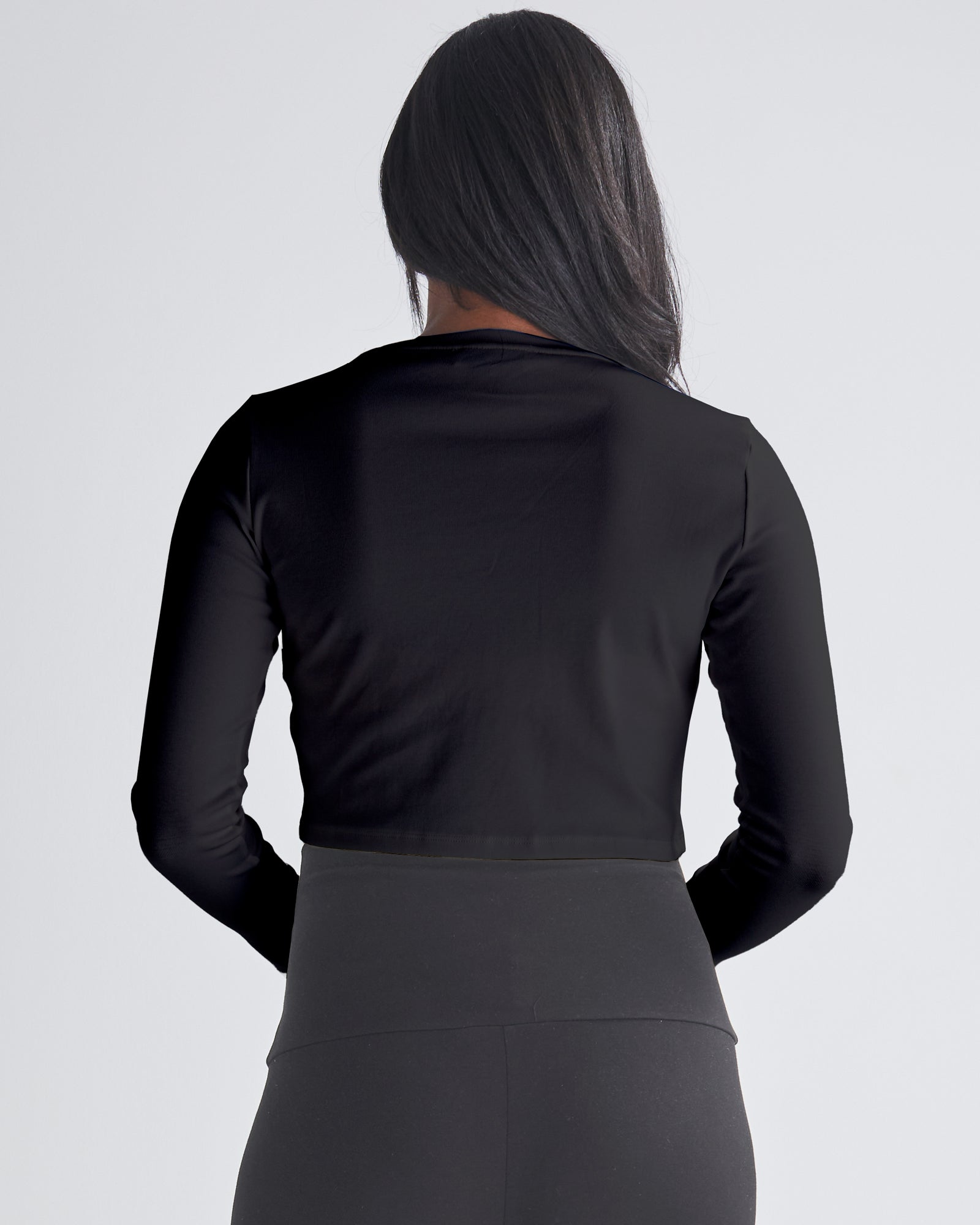 Back View - A Pregnant Woman Wearing Long Sleeve Cotton Black Maternity Crop Top from Angel Maternity