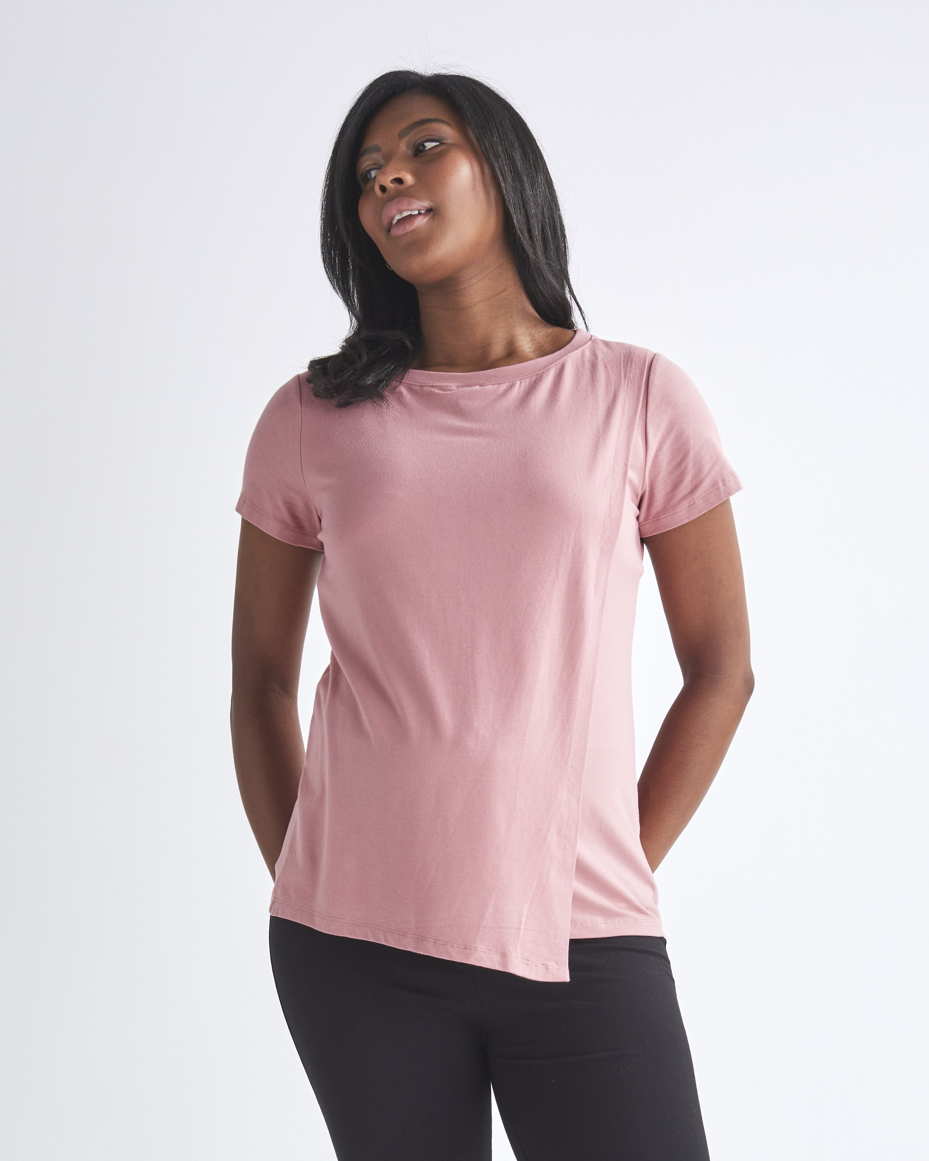 A woman wearing easy access to breastfeeding nursing top with petal front design from Angel Maternity