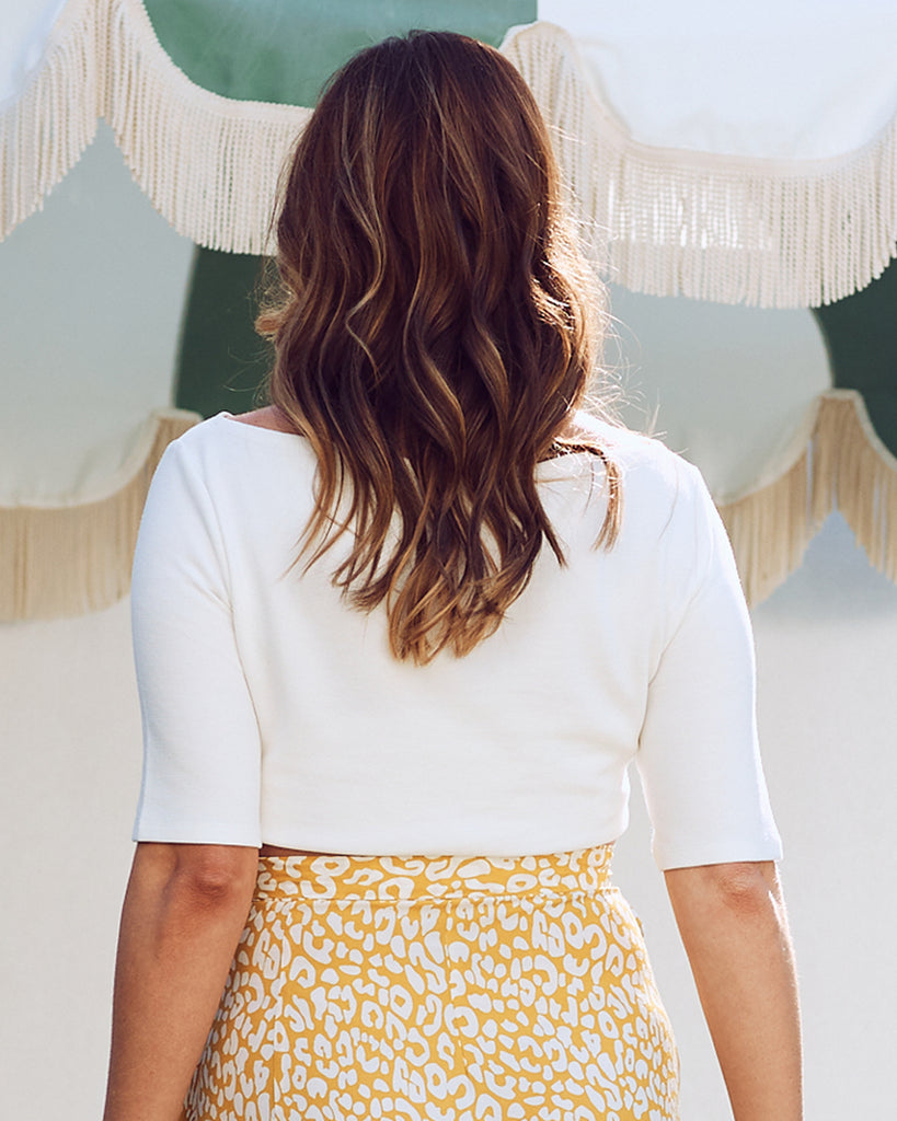 Back view- maternity cross over off shoulder top white