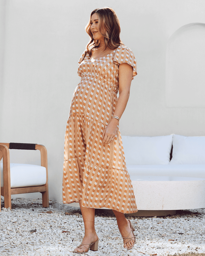 Side view - Maternity ruffled baby shower dress gingham camel