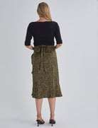 Back view-Throw on and go Midi skirt Designed to fit through all stages of pregnancy Wrap design Ruffled hem from AngelMaternity