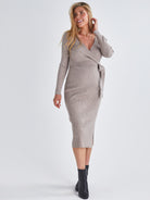 A Pregnant Woman Wearing Full Sleeve Knit Maternity Midi Dress in Gravel from Angel Maternity