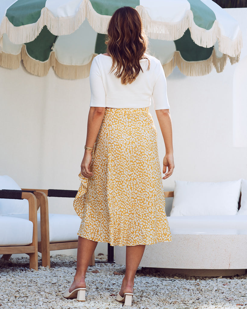 Back  view - maternity wrap ruffled skirt in mustard leopard print