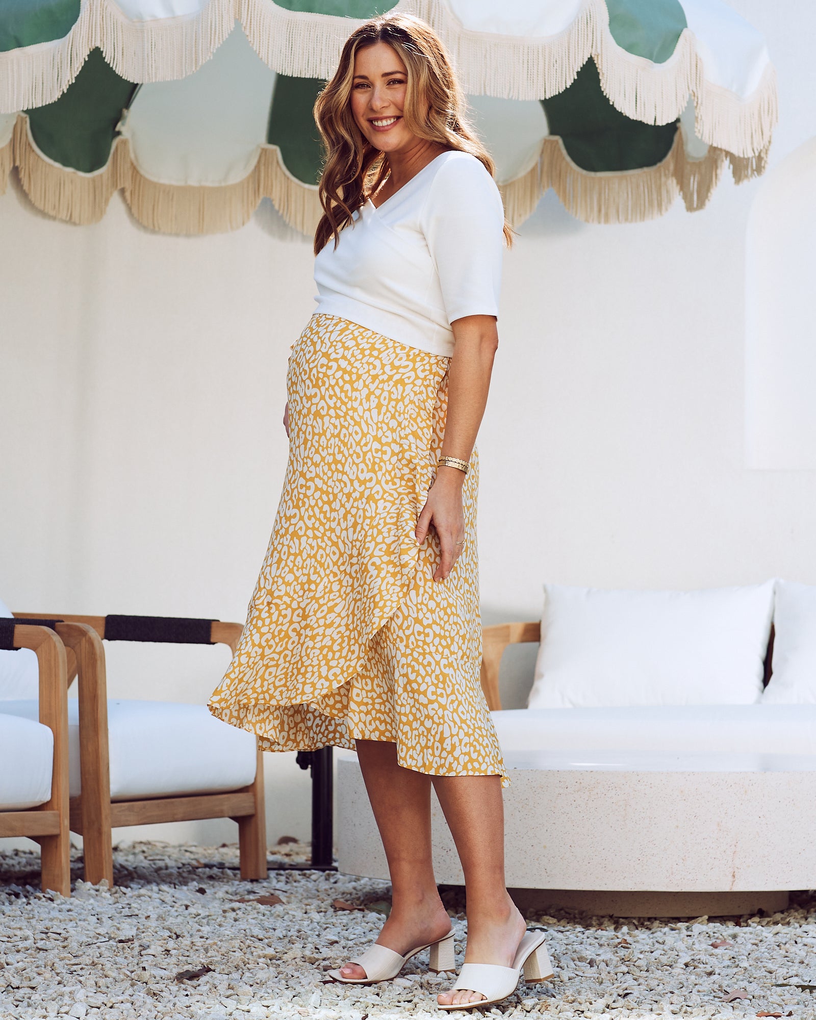 Side view - maternity wrap ruffled skirt in mustard leopard print