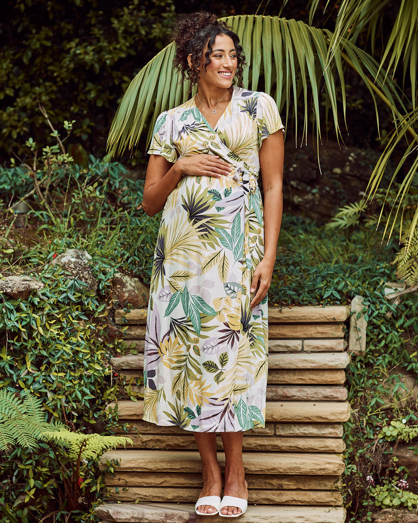 Front View - Maternity v neck wrap dress in green flora