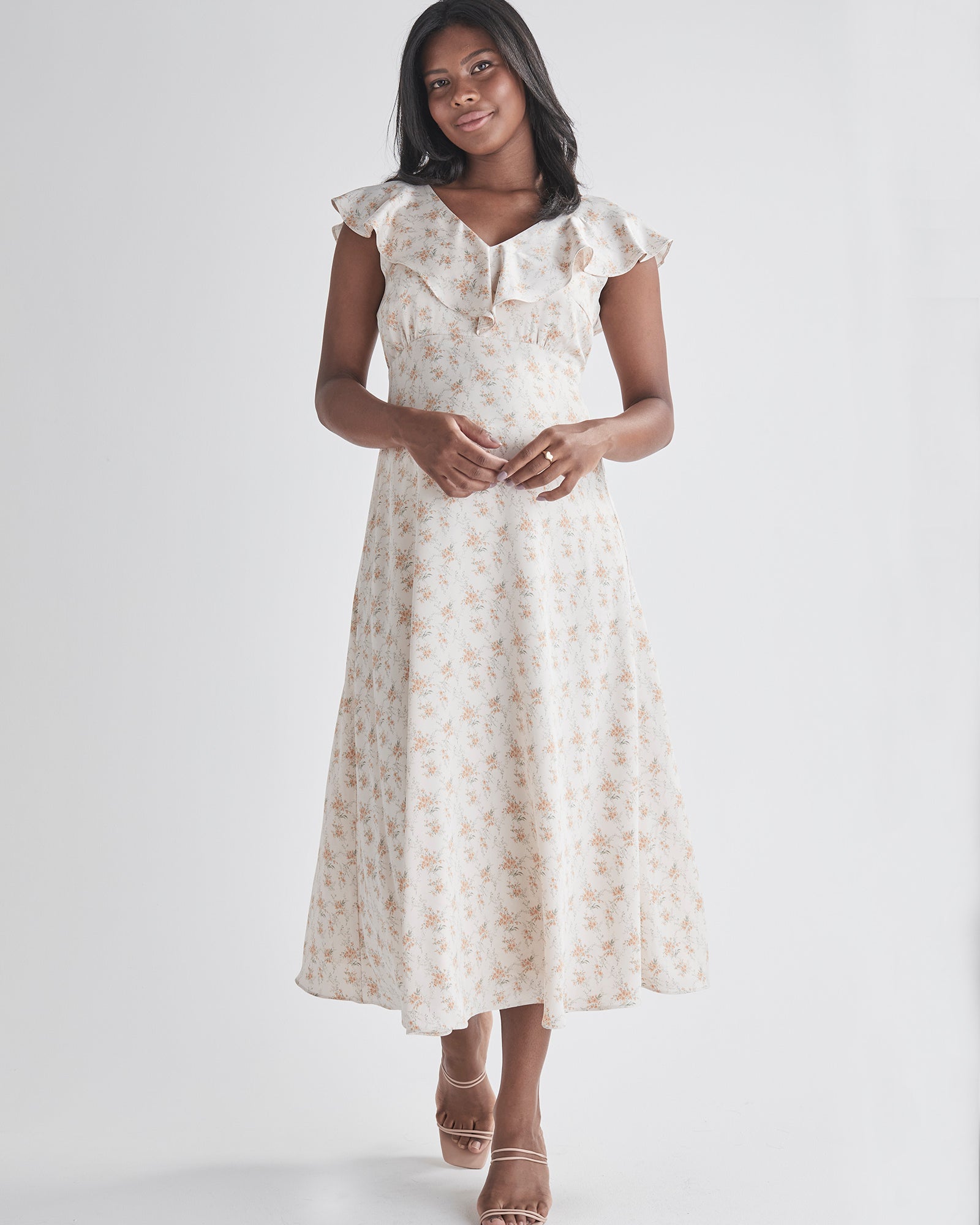 Front view-Delicate ruffle detail at neckline - Smocked, stretch back for comfort - Midi length A-line - Lined top fron Angel Maternity