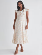 Main view-Delicate ruffle detail at neckline  - Smocked, stretch back for comfort  - Midi length A-line - Lined top fron Angel Maternity