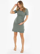 Full View - A Pregnant Woman Maternity Short Sleeve Frilled Dress in Dusty Mint
