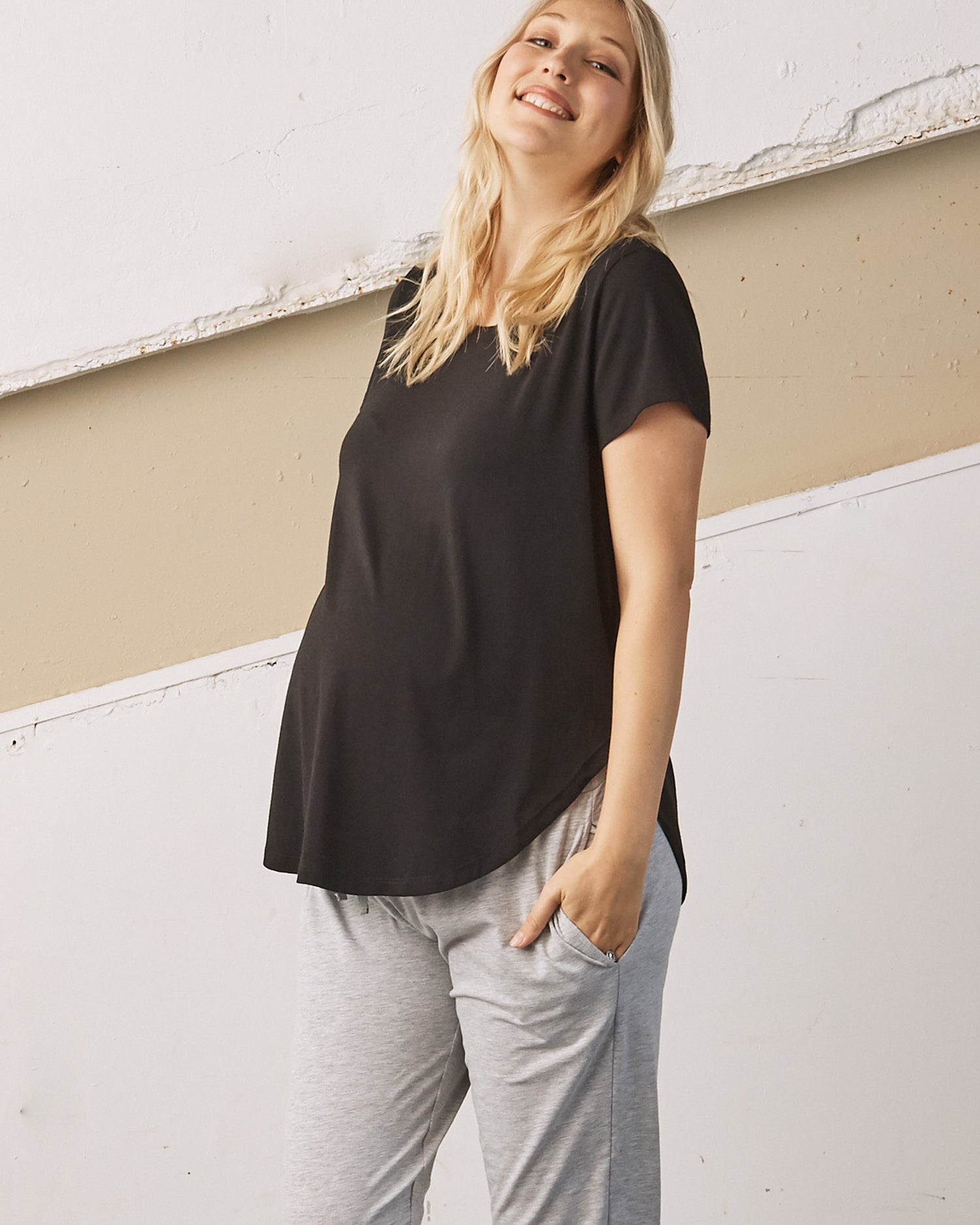 Main view - A Pregnant Woman in Black Basic Maternity Bamboo/Cotton T-shirt (6709414953063)