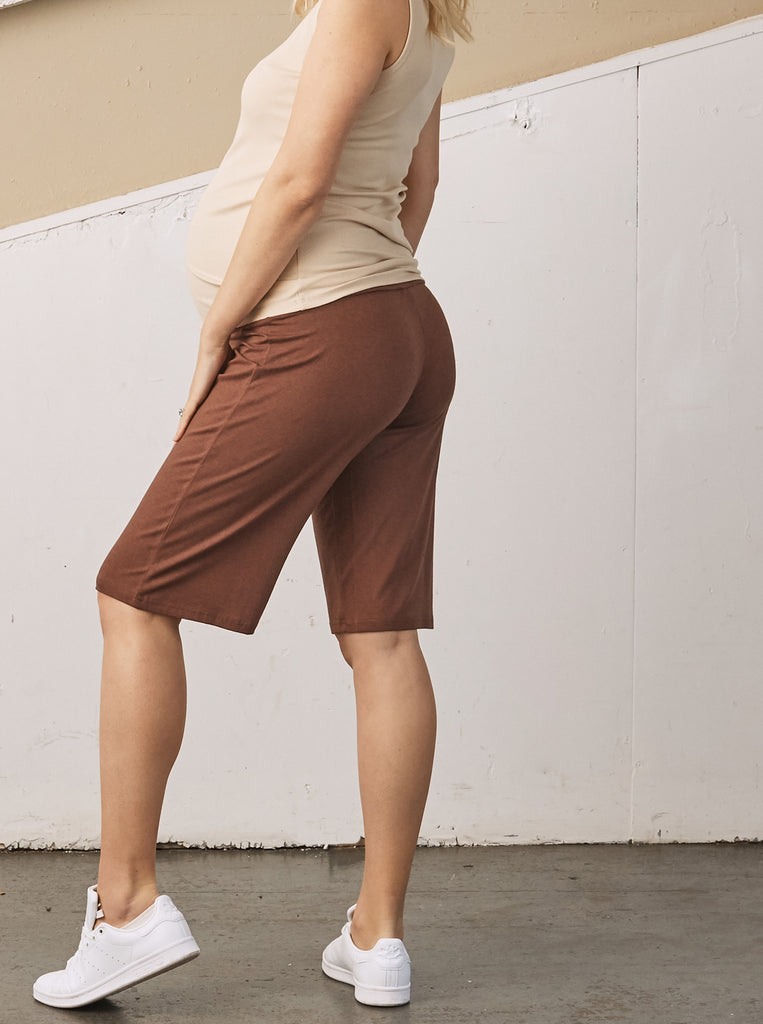 Side view 2 - A Pregnant Woman in Chocolate Brown Wide Leg Knee Length Bamboo Maternity Shorts (6707663011943)