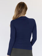A women in long sleeve black navy bamboo maternity v-neck crossover top, back (2242995290215)
