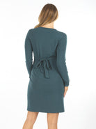 A woman in Madison cross over teal maternity dress, back (6593995014247)