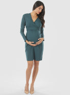 A woman in Madison cross over teal maternity dress, front (6593995014247)