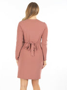 A woman in Madison pink maternity dress, back (6593998422119)