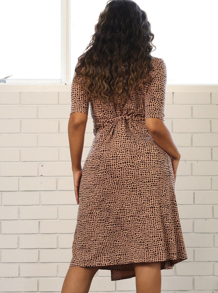 Back view - A Pregnant Woman in Classic Maternity Wrap  Dress in Brown Print (6699013931111)