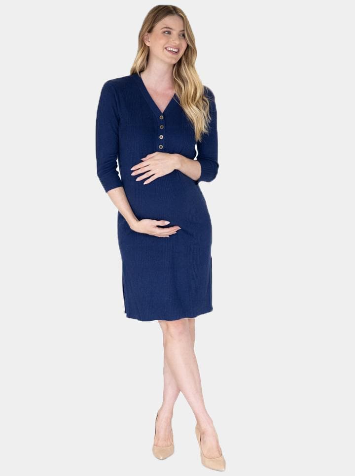 A women smiling in knit ribbed button front maternity & nursing friendly navy blue dress. Front view. (4589795803239)